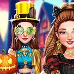 Dwie kobiety w kostiumach na tle dyni z wyciętą twarzą i domków w stylu Halloween