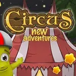 Zielony stworek w kasku wskazujący na czerwono-biały namiot cyrkowy w tle, otoczony złotymi gwiazdkami i napisem Circus New Adventures