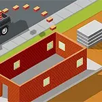 Ciężarówka z cegłami przy placu budowy z nieukończoną ceglaną konstrukcją