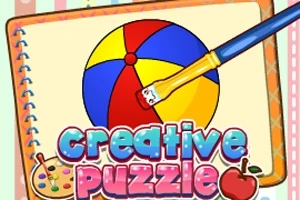 Piłka plażowa w kolorach czerwonym, niebieskim i żółtym malowana pędzlem z podpisem creative puzzle na tle notesu z rysunkami artystycznymi