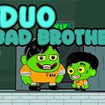 Zielone postacie z kreskówki w pomarańczowych kombinezonach na tle wyjścia, z napisem DUO BAD BROTHERS u góry