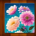 Kwiatowy puzzle z różowymi i kremowymi kwiatami na niebieskim tle