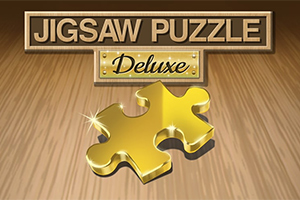 Złoty kawałek układanki z napisem Jigsaw Puzzle Deluxe na drewnianym tle