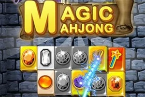 Kolorowe kamienie na tle szarej ściany z dużym napisem i magiczną różdżką