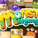 Kolorowy napis Monster Mahjong otoczony zabawnymi, różnorodnymi potworami na tle kafelków