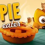 Postać z pomarańczową maską i dużymi oczami patrzy na parujący placek na stole, z napisem PIE eater w tle