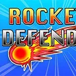 Napis Rockets Defender na tle niebieskiego promienistego wzoru oraz grafika płonącego meteoru
