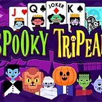 Kolorowa grafika z kartami do gry i postaciami potworów na tle nawiedzonego domu z napisem Spooky TriPeaks