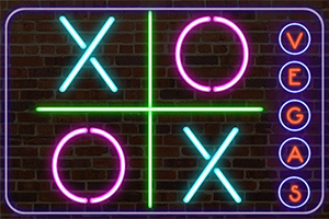Neonowy napis na tle ceglanej ściany z symbolami X i O oraz słowem VEGAS obok